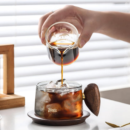 Bincoo Glass Coffee Cups and Saucers Set,250ML Clear Glass Iced Coffee Mug Espresso Cup Tea Cup with Walnut Coaster and Handle (Clear)